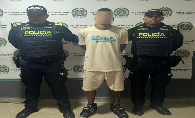 Policía y capturado