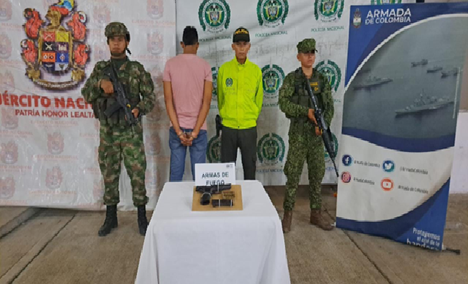 Capturados con  un arma de fuego tipo pistola calibre 9 mm