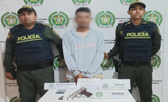 Iba en una moto cuando le encontraron el arma