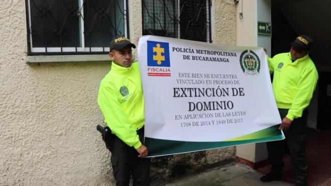 Extinción de dominio a 10 bienes inmuebles y 6 motocicletas