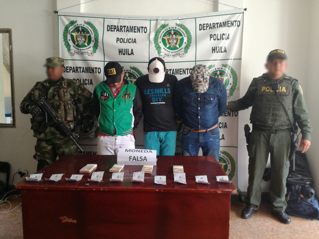 capturados-con-dolares-y-pesos-falsos-Huila